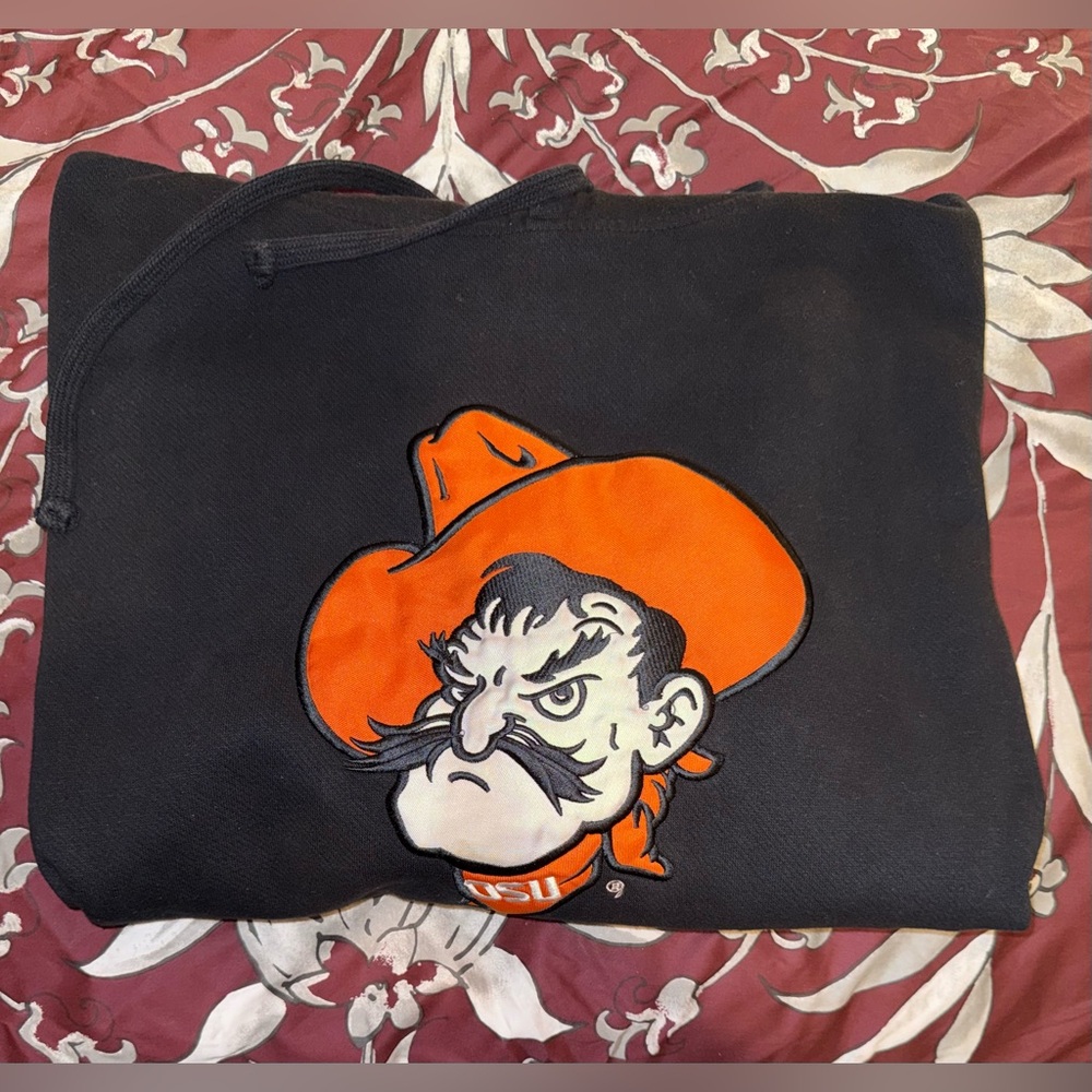Blue 84 Black Hoodie with Orange Oklahoma Cowboy Graphic